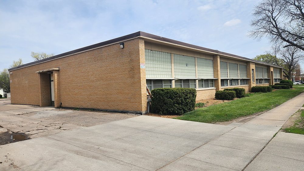 The classroom wing of a brick elementary school